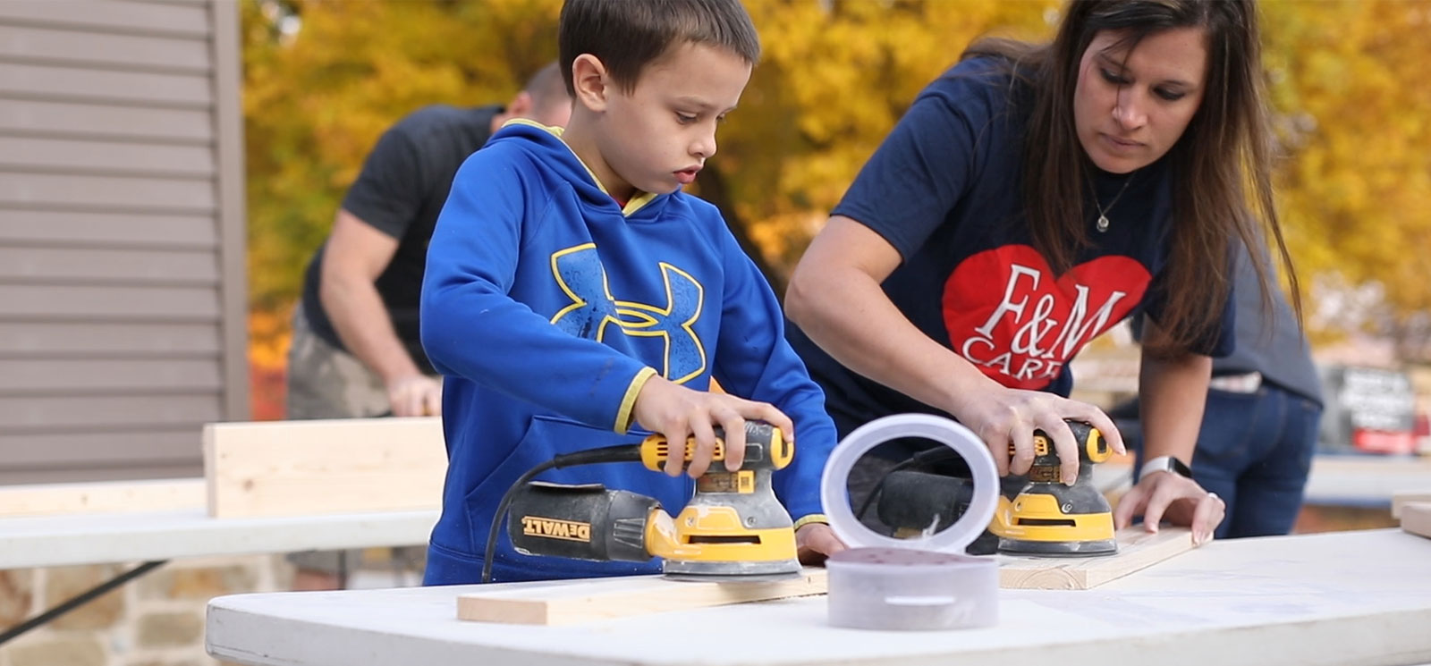 Woman and kid working