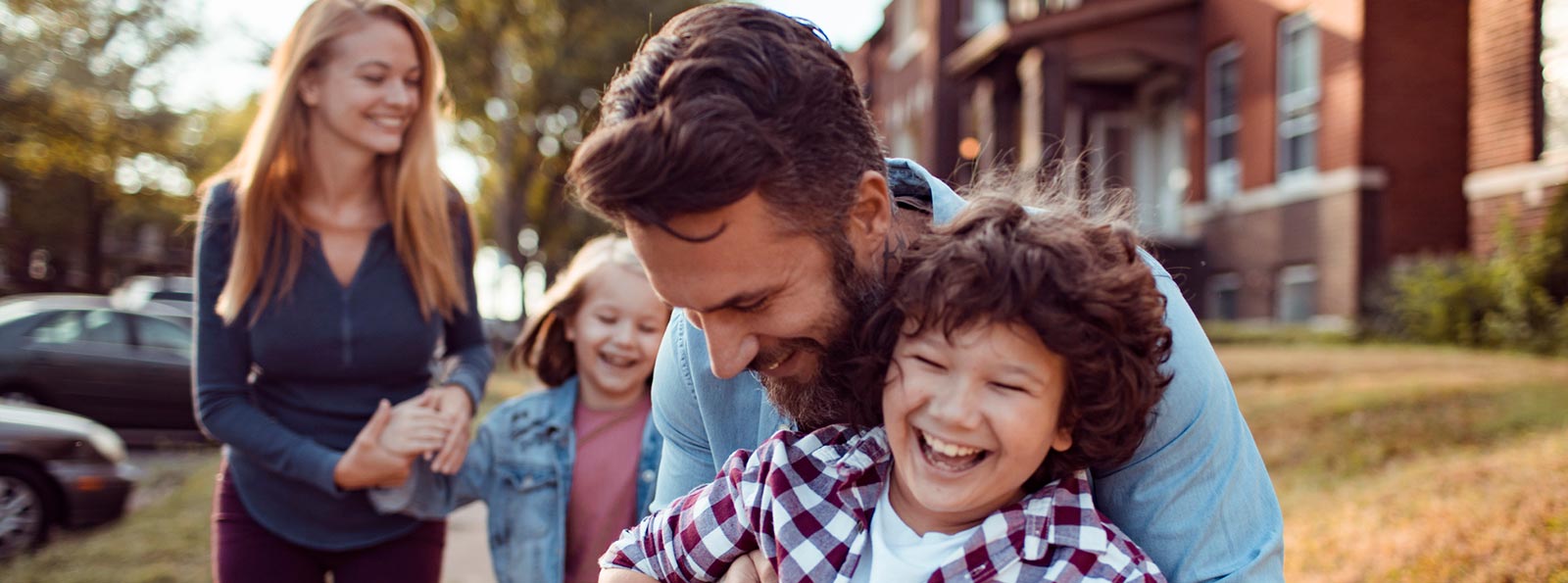 Family going on a walk in their neighborhood
